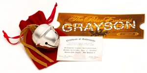 Polar Exp sleigh bell with personalized replica golden ticket, velvet gift bag, and Certificate of Authenticity. Optional upgrade to customized Certificate of Authenticity now available